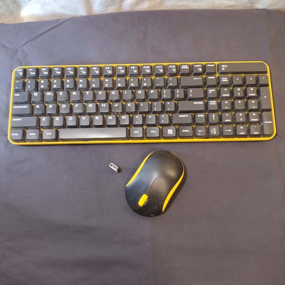 Logitech Black and Yellow Wireless Keyboard and Mouse Combo